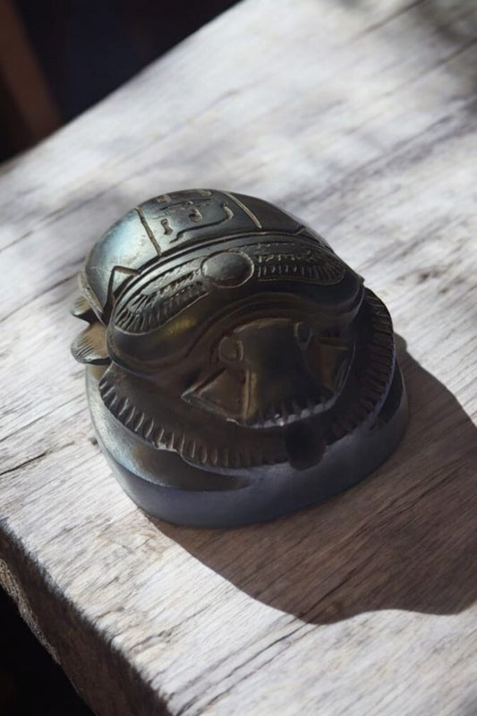 hand-carved scarab beetle paperweight
